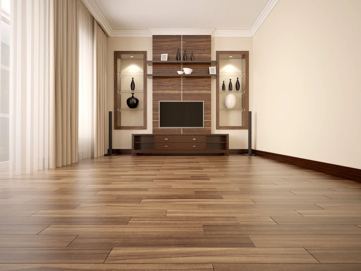 Salon moderne avec meuble TV intégré en bois foncé, étagères illuminées contenant objets décoratifs, écran plat encastré